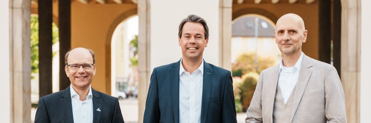 Drei Herren des Stadtvorstands