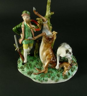 Jagdszene mit zur Strecke gebrachtem Hirsch und Jagdhund