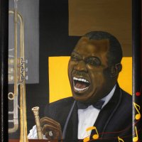 Zu sehen ist ein Bild von Louis Armstrong