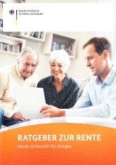 Drei Personen lesen ein Papier.